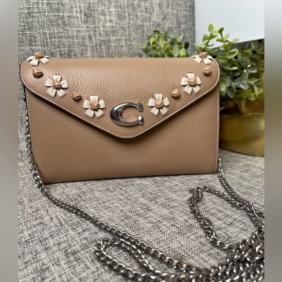 Coach Handbags - $139(NWT) Coach Tammie Clutch Crossbody with floral Whipstitch.
